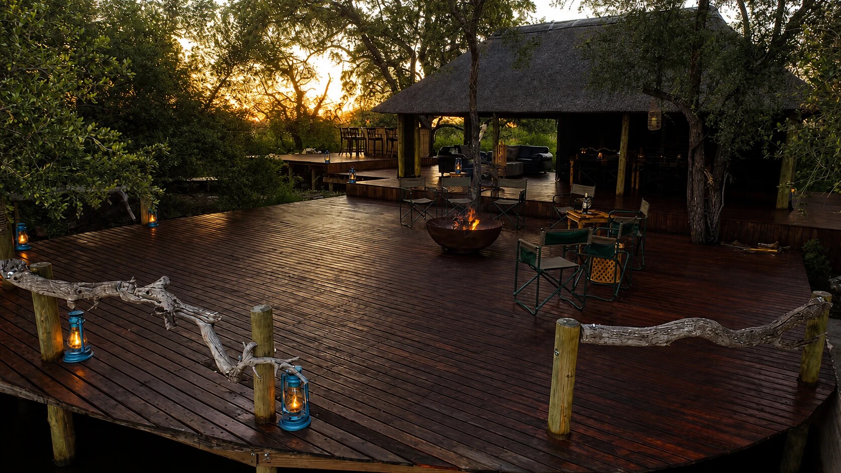 Private Botswana safari camp deck at dusk