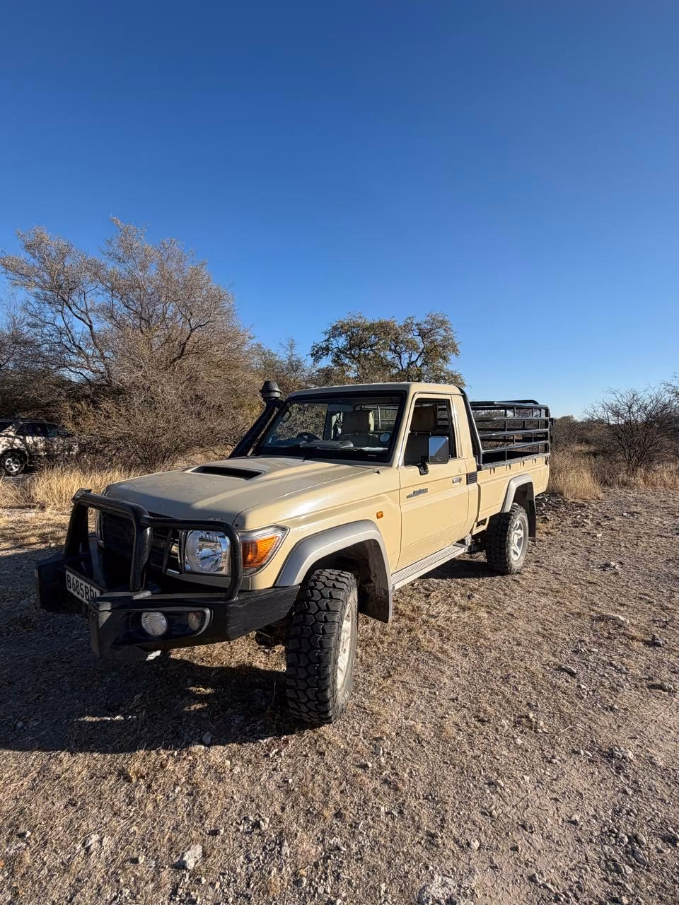 The Hunter Troopers field vehicle parked in Kalahari bush near Ghanzi